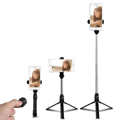 China Outdoor Portable Wireless Smart Extendable Phone Selfie Holder Tripod Selfie Stick for sale