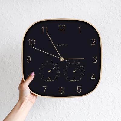 China Antique Creative Nordic Room Clock Metal Frame Lliving Style Wall Clock Metal Frame Scan Code Temperature Hygrometer Mute Quartz Wall Clock for sale