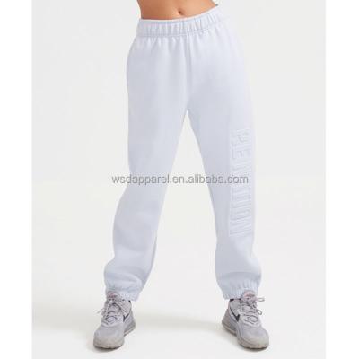 China Anti-wrinkle women solid color 3d embossed pants custom outdoor casual running emboss print sport tracksuit for sale