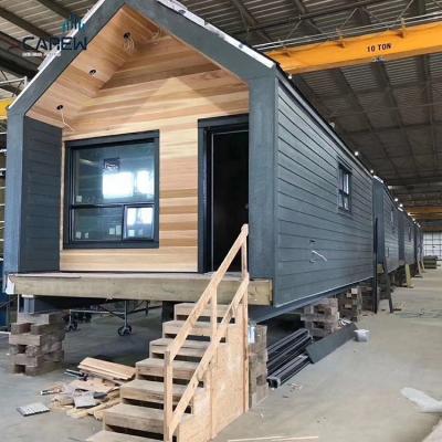 China Modular Tiny Log Wooden House Luxury Light Steel Frame Hurricane Proof Turnkey Kits for sale