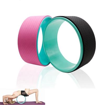 China Fitness Training Sports Yoga Pilates Roller Eco-friendly Wheel Massage Back Tape Yoga Wheel for sale