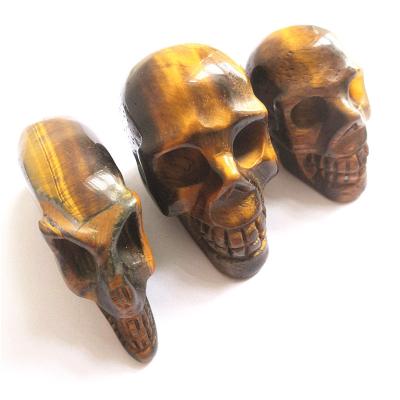 China China Wholesale Natural Hand Carved Crystal Crafts Yellow Tiger Eye Skulls For Home Decoration for sale