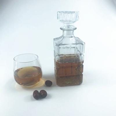 China Custom 950ml Amber Glass Beverage Jars With Glass Lids For Whiskey Wine Liquor for sale