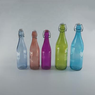 China Sustainable 500ml Colored Glass Water Bottle With Clip Top Lid for sale