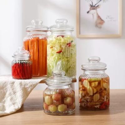 China Viable Different Size Storage Glass Jar For Food With Glass Lid for sale