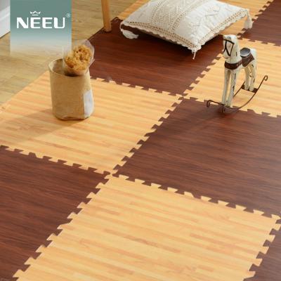 China EVA Wood Grain Ground Carpet Washable Split Joint Puzzle Mat for sale