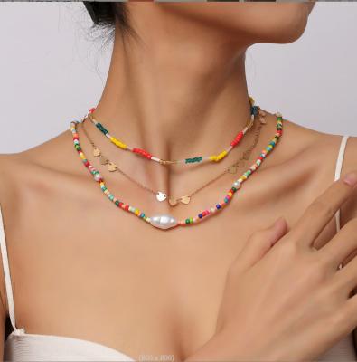 China Newest handmade BOHEMIA girls multilayer BOHEMIA necklace set colorful beaded heart chains chocker necklaces for women for sale