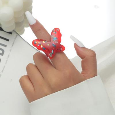 China 2021 Wholesale Trend Women Funny Hyperbola Rings Shape Geometric Butterfly Ring Hot Sale Resin Acrylic Rings For Girls for sale