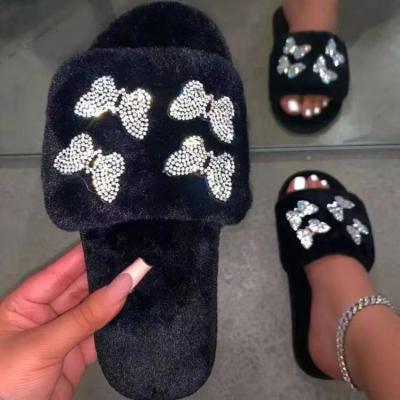 China Outdoor women's hair shoes new butterfly drill European and American other other plush 2021 large size slippers for sale