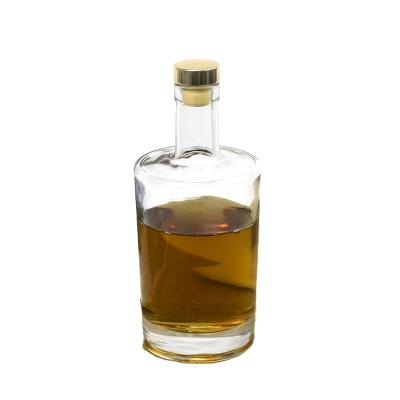 China Beverage factory price 700ml vodka brandy wine glass liquor packaging bottle clear glass liquor whiskey bottle for sale