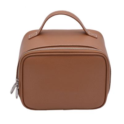 China Fashion Designer Wash Waterproof Leather Portable Cosmetic Bag Universal PU Makeup Bag for sale