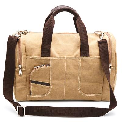 China Custom Large Capacity Vintage Canvas Travel Duffel Bag Outdoor Weekender Bag Waterproof Travel Bag for sale