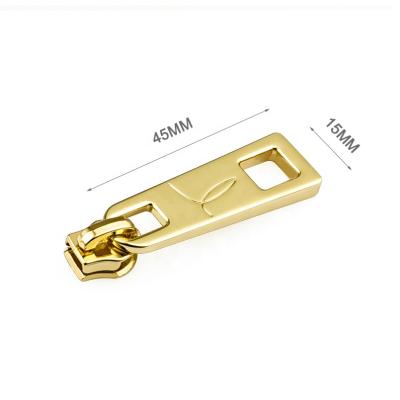 China Wholesale Shiny Nickel Free Gold Metal Zipper Puller For Handbag, 5# Custom Metal Zipper Pull Slider With Logo For Garment for sale