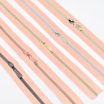 China Factory Price Pink 3# Nylon Zipper Band 5 Nylon Zipper Custom Wholesale Long Chain Nickel Free Zipper Roll For Garment And Bags for sale