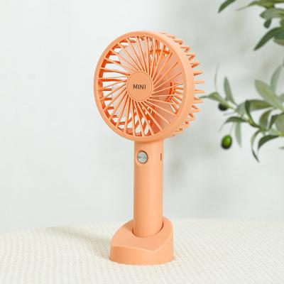 China Outdoor Fan Mini Electric Hand Fan Phone Holder 1200mah Big Battery Rechargeable Mini Portable Handheld Fan for sale