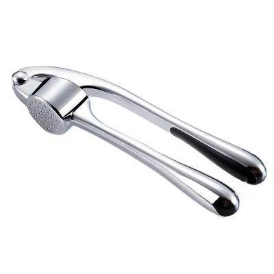 China Sustainable Kitchen Instruments Garlic Press Manual Zinc Alloy Garlic Crusher for sale