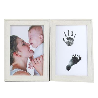 China Simple Modern Wooden Handprint Baby Footprint Frame and Photo Frame Kit My First Year Picture for Babies for sale