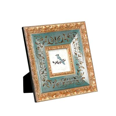 China Retro Style Fashionable Luxury American Vintage Picture Frames Solid Wood Baroque Picture Frame for sale