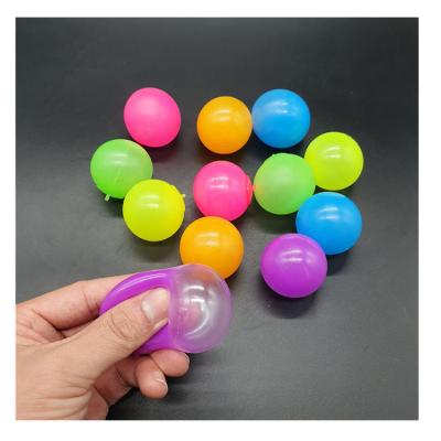 China Relaxing Toy Glow In The Dark Glowing Sticky Balls Eco-Friendly Ceiling Wall Sticky Ball for sale