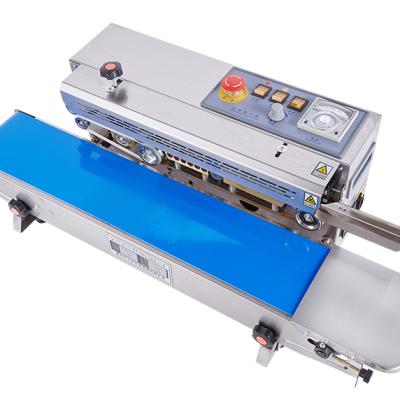 China Vertical Continuous Food Stainless Steel Band Sealer Machine for sale