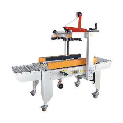 China FXJ-4030 Food Machine Carton Box Sealer Top Left Right Drive Sealing Machine for sale