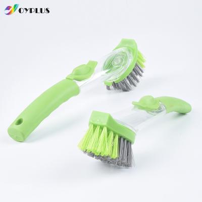 China Universal High Capacity Dish Soap Brush Cleaner Washable Sustainable Cleaning Brush with Soap Dispenser for sale