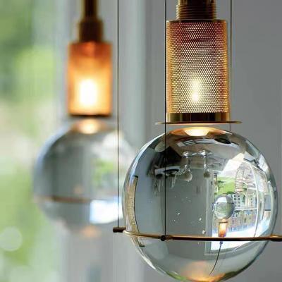 China Modern luxury gold fitting Nordic post-modern design decorative kitchen island dining bedside Crystal Glass Ball Pendant Light simple for sale