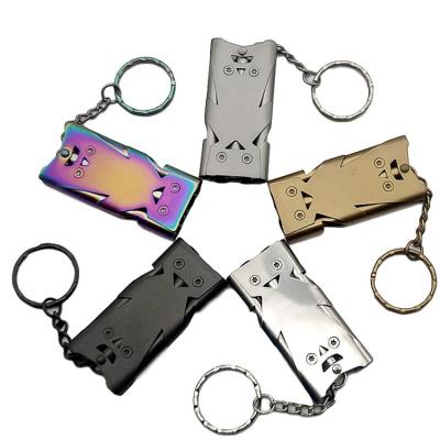 China Hot Sale Outdoor Camping Customize Logo Mini Metal Three Tube High Frequency Whistle With Key Chain for sale