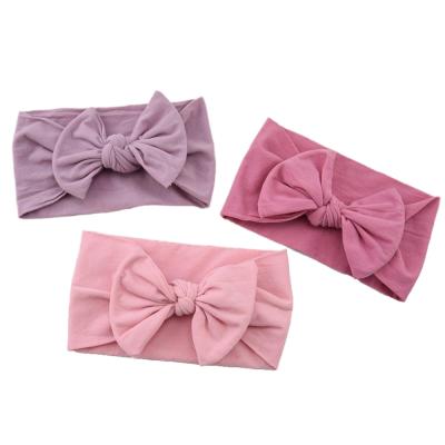 China Hot Sale Baby Cloth Super Soft Wide Stocking Headband Nylon Bowknot Children Hair Band for sale