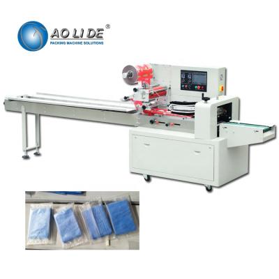 China Automatic CLOTHING Flow Bath Kitchen Hotel Bar Mop Sponge Towel Plastic Bag Machine For Towel Wrapping for sale