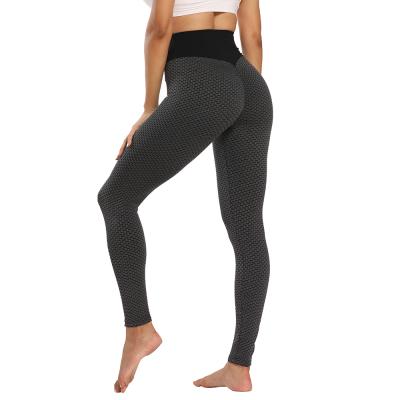 China Yoga Clothes Women's Breathable Sports Thickened Peach Waist Hip Lift Fitness Pants Jacquard Bubble Yoga Pants High Top for sale