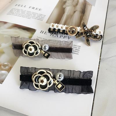 China Designer Brand Collection Hair Accessories Hair Clips Hair Accessories Lace Up Flower Hair Clips Hairpins Girls Headwear for sale