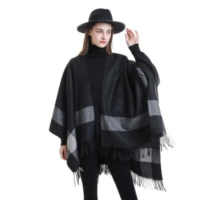 China Amazon Gradient Plaid Warm Keeping Hot Selling Cape With A Cape Autumn Winter Warm Blanket Scarf Tassel Woven Shawl for sale