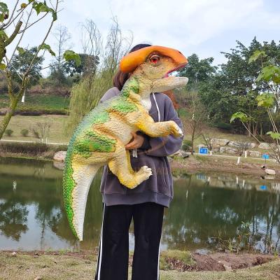 China Ein realistisches Baby-Dinosaurier-Handpuppen-Kostüm, eine Drachenhandpuppe für den Dino Park. zu verkaufen