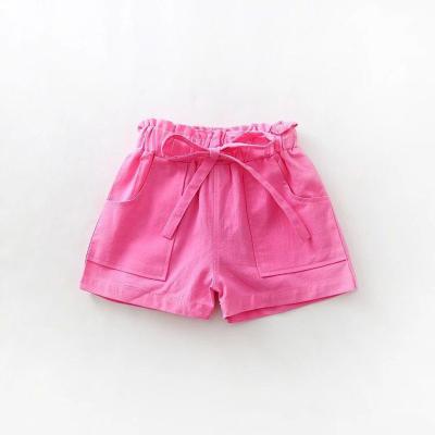 China Custom OEM Hot Stamping Logo Breathable Pure Color Belts Kids 100% Cotton Mid Waist Swim Beach Surfers Girls Shorts for sale