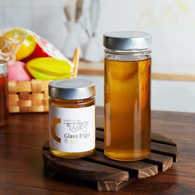 China Freshness Preservation Factory Maker Honey Jars Transparent Empty Glass Honey Container With Lid for sale