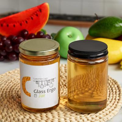 China Empty Transparent Black Honey Container Glass Freshness Preservation Lid Packaging Glass Jar With Screw Lid for sale