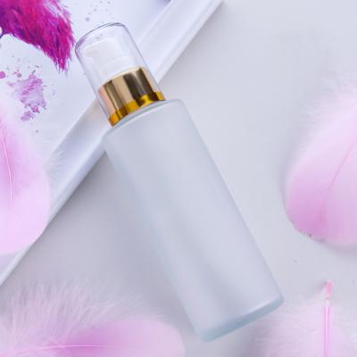 China 100ml Personal Care Cosmetic Containers Paper Frosted Glass With Pump Lotion Bottle Factory Price for sale