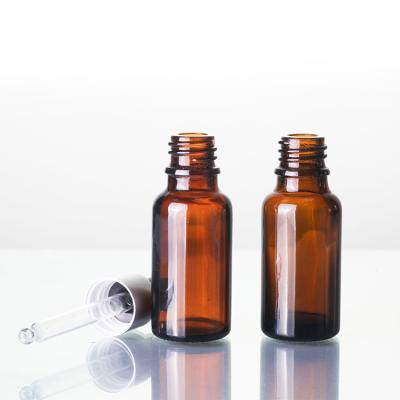 China Bottle of Amber Round Glass Essential Oil for Personal Care for sale