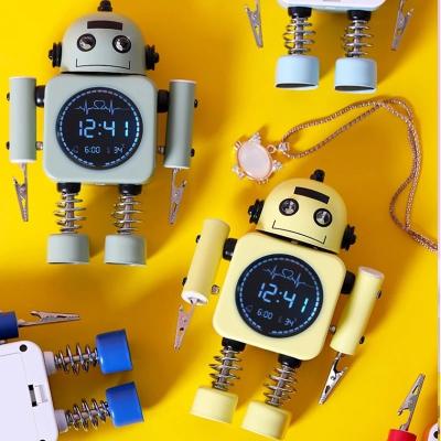 China LUMINOVA multifunctional robot digital alarm clock male temperature desktop display and student bedroom note LED holder for sale