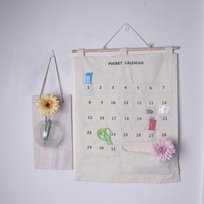 China 2022 Hot Viable Style Creative Waterproof Cotton And Wall Mounted Hanging Canvas Storage Bag Storage Organizer Storage Bag for sale