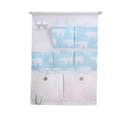 China 2022 Viable House Modeling Wall Storage Bag 6 Pockets Flamingo Pattern Storage Bag Multifunctional Folding Various Hanging Bag for sale