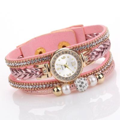 China Vintage simple fashionable women's bracelet watch diamond buckle pearl beaded cord leather compact woven women's band watch reloj for sale