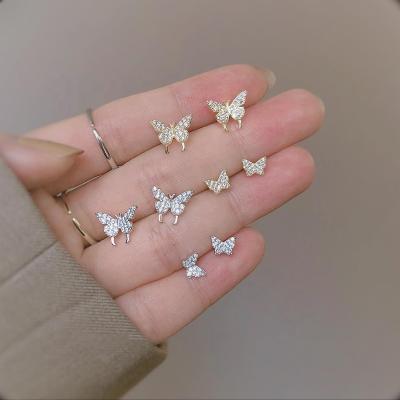 China Beautiful 925 Sterling Silver Tasty FASHIONABLE Gold Plating Needle Butterfly Inlay Micro Zircon White Sparkly Single Stud Earrings For Women for sale