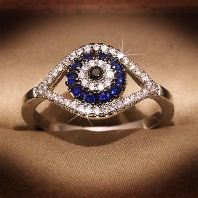 China Latest Fashion Trendy Women Jewelry Brass Silver Plated Micro Inlay Zircon Blue Eyes Shiny Rings For Party for sale