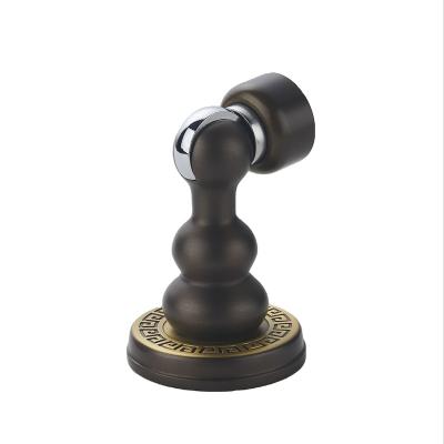 China Easy Installation China Supplier Available In Multiple Scenarios Black Brass Metal Door Stopper for sale