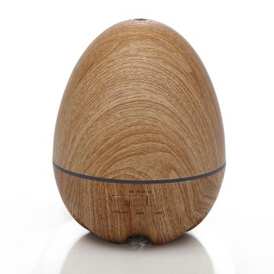 China ABS+PP Wood Grain Egg Shape Ultrasonic Air Mist Fragrance Essential Oil Aroma Diffuser with Colorful Night Light for sale