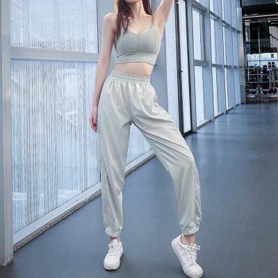 China Girls Breathable Sides Reflective Brand Fashion Purple Sweatpants Casual Pants Customized for sale