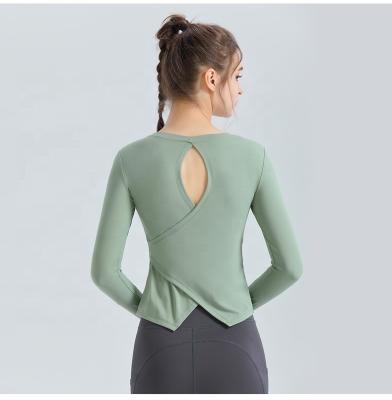 China Wholesale Custom Made Breathable Long Sleeve Cutout Design Cross Back Yoga Tops for sale