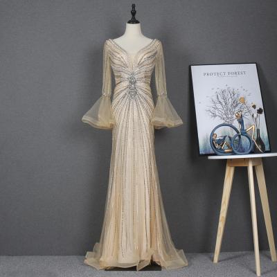 China Lady Prom Gowns Style Fashion Dresses 2021 Luxury Beaded Long Sleeve Evening Dresses Gold Color V-Neckline Dry Cleaning New for sale